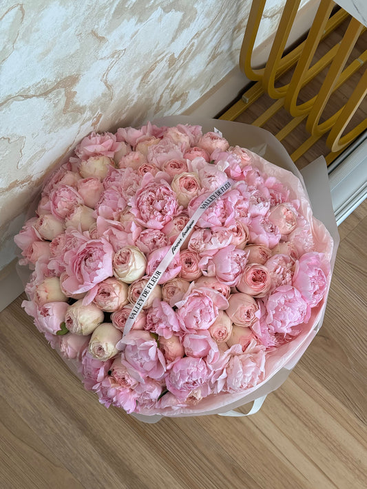100 stems of light pink peonies and garden roses