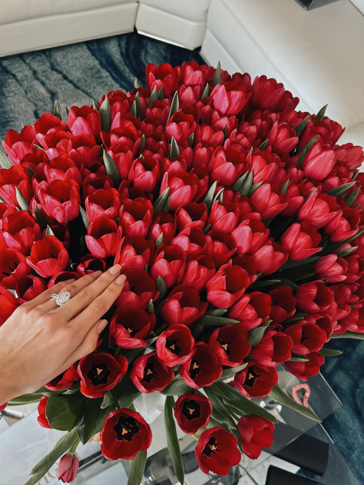 100 Red Tulips in Designer Basket
