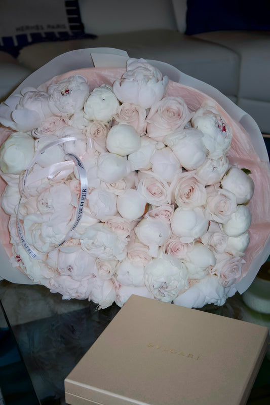 Luxury bouquet featuring 50 peonies and 50 roses