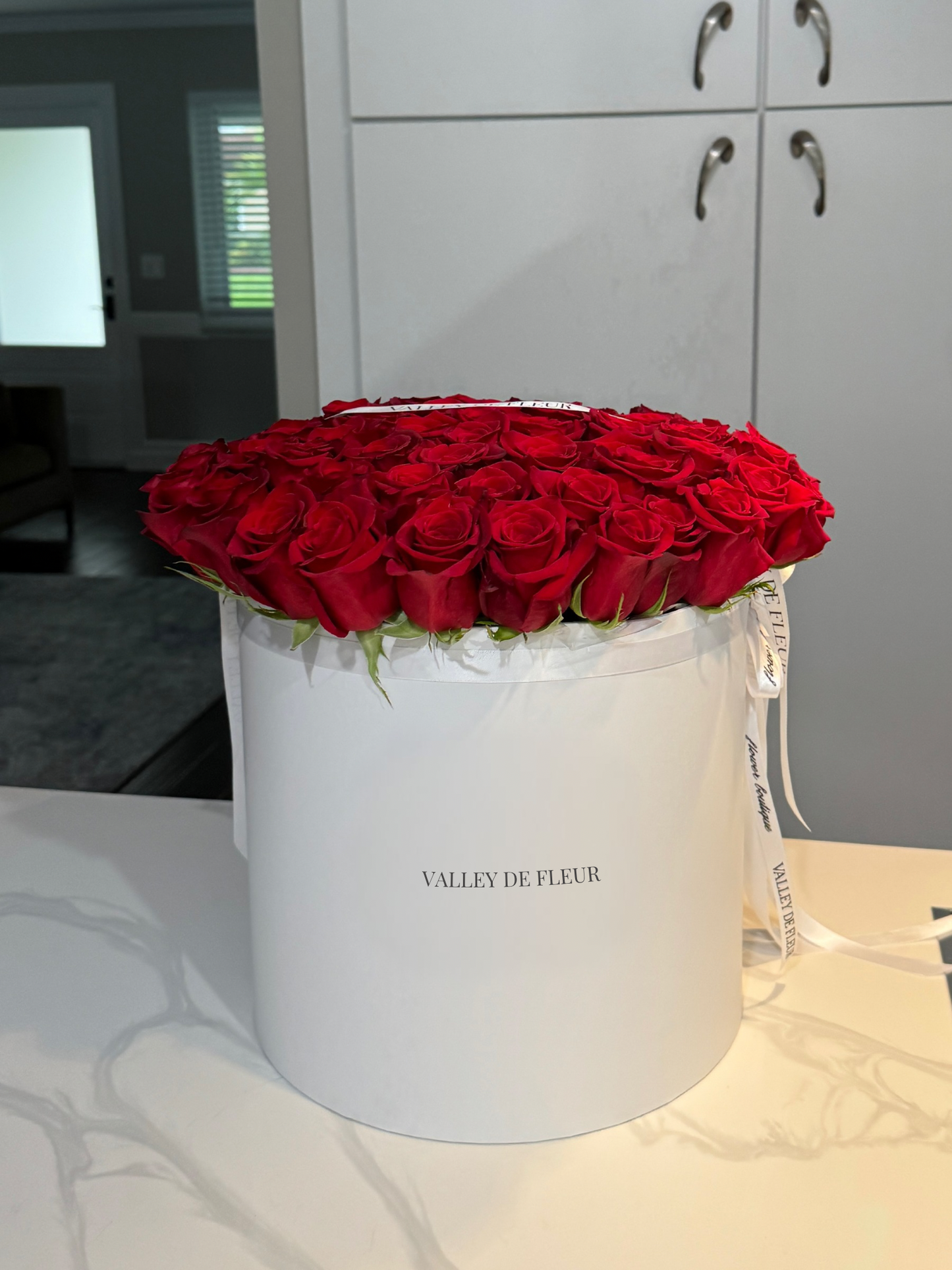 50 Red Roses in Signature White Box