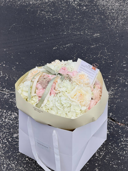 Birthday bouquet with Soft hydrangeas and mixed roses