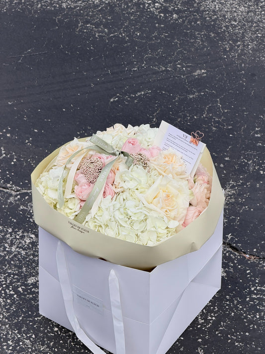 Birthday bouquet with Soft hydrangeas and mixed roses