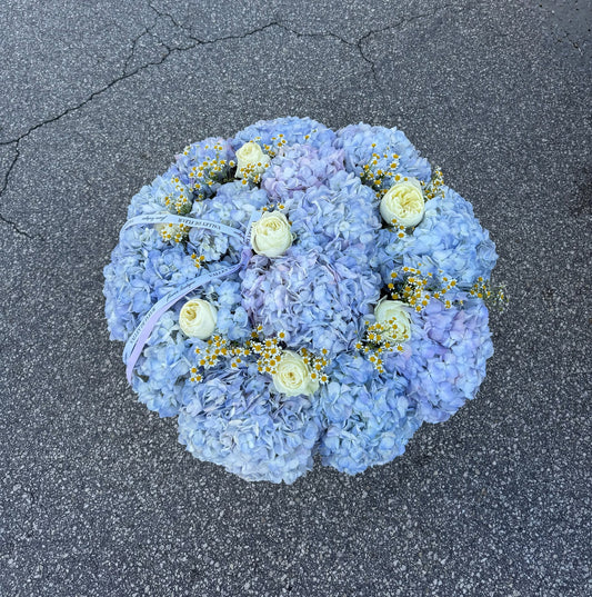 Large Blue Cloud hydrangea flower basket with fresh blue hydrangeas, white roses, and chamomile flowers by Valley De Fleur