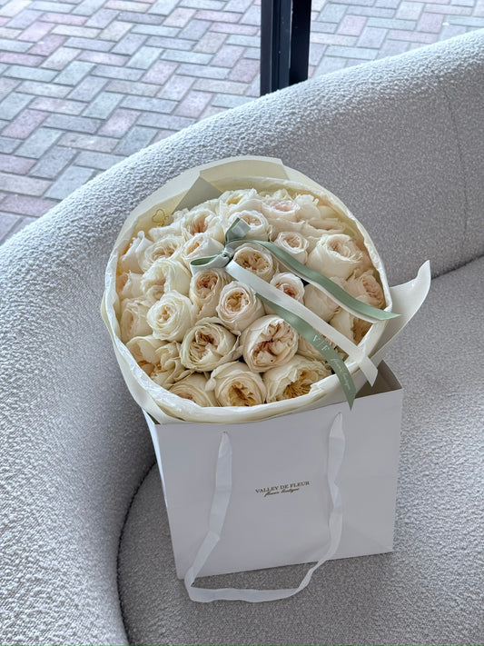 Cream garden roses in the Cream Couture Bouquet with 25 stems
