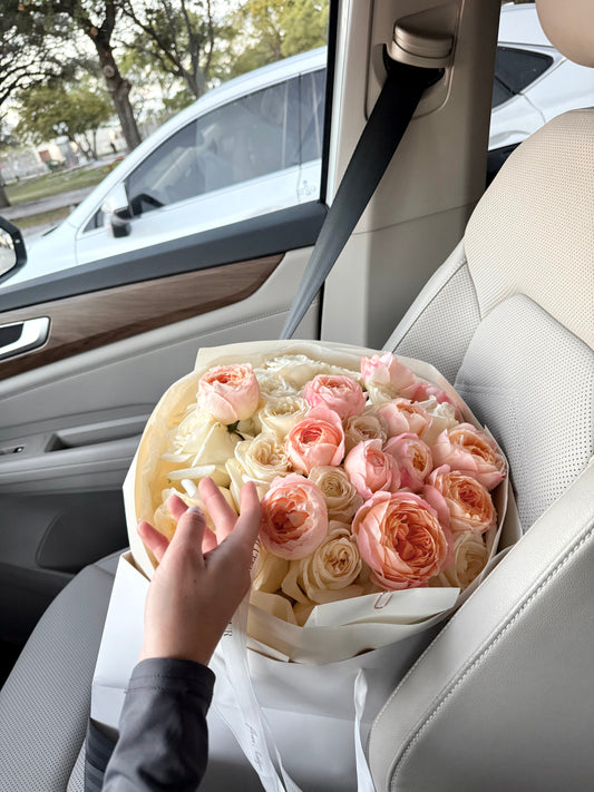 Peach Garden Glow bouquet featuring roses and garden roses