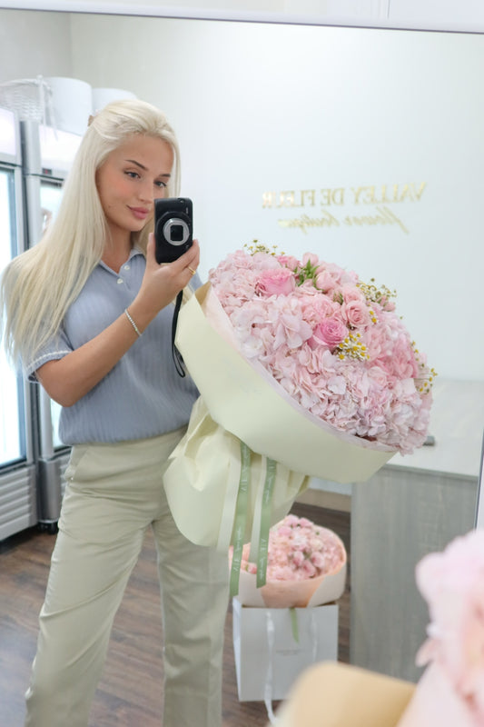 Pink Majesty bouquet featuring hydrangeas and spray roses