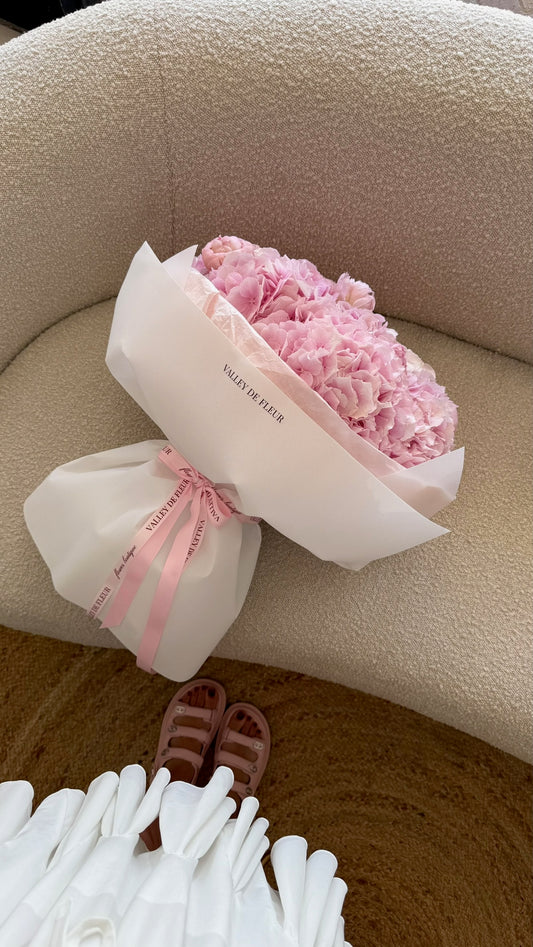 Pink peonies and hydrangeas bouquet