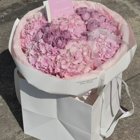 Light pink hydrangeas and lavender spray roses birthday bouquet ready for delivery across Miami-Dade and Broward County