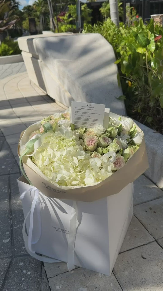 White hydrangeas and green spray roses birthday bouquet ready for delivery across Miami-Dade and Broward County