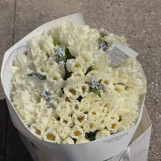 White ruffled tulips birthday bouquet ready for flower delivery across Miami-Dade and Broward County