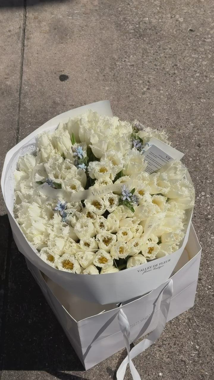 White ruffled tulips birthday bouquet ready for flower delivery across Miami-Dade and Broward County