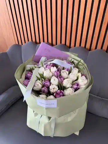 Fresh purple tulips bouquet arranged beautifully for gifting with same-day flower delivery