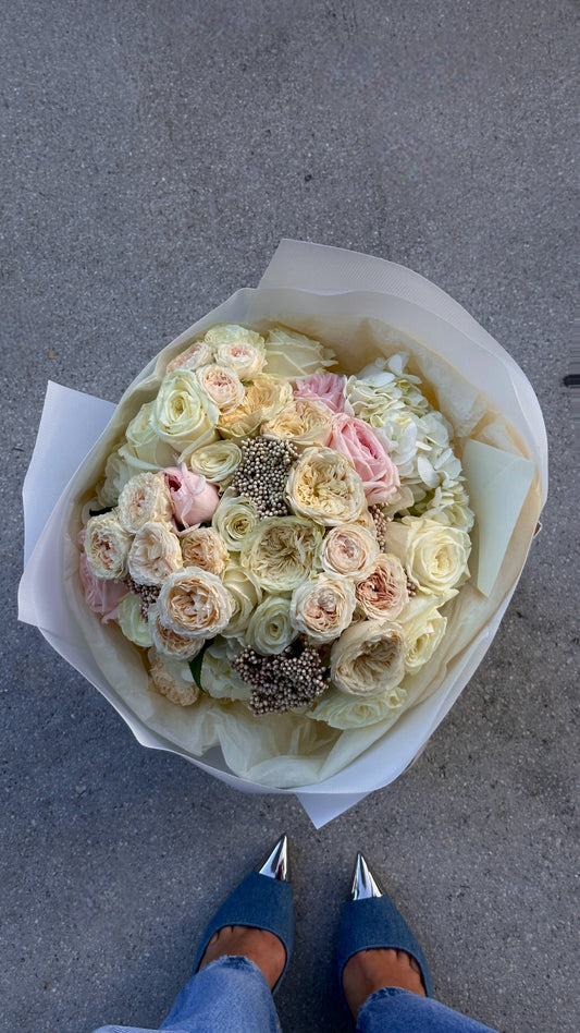 Golden Hour arrangement featuring garden roses and hydrangeas