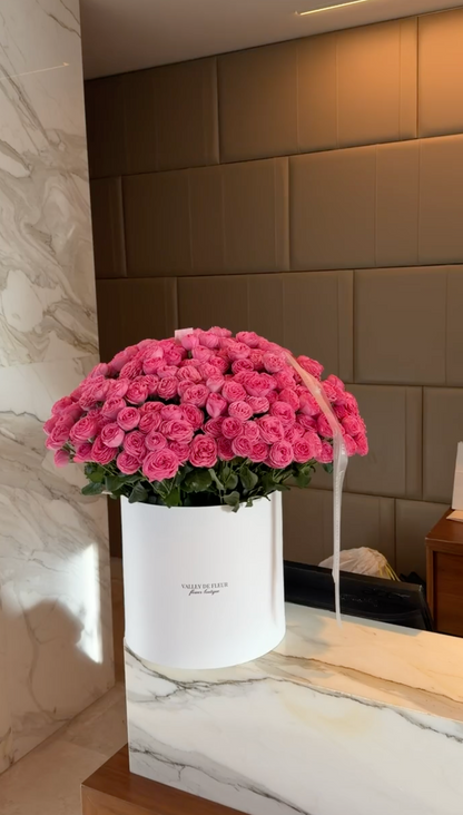Elegant spray pink roses birthday flower arrangement in a white luxury flower box