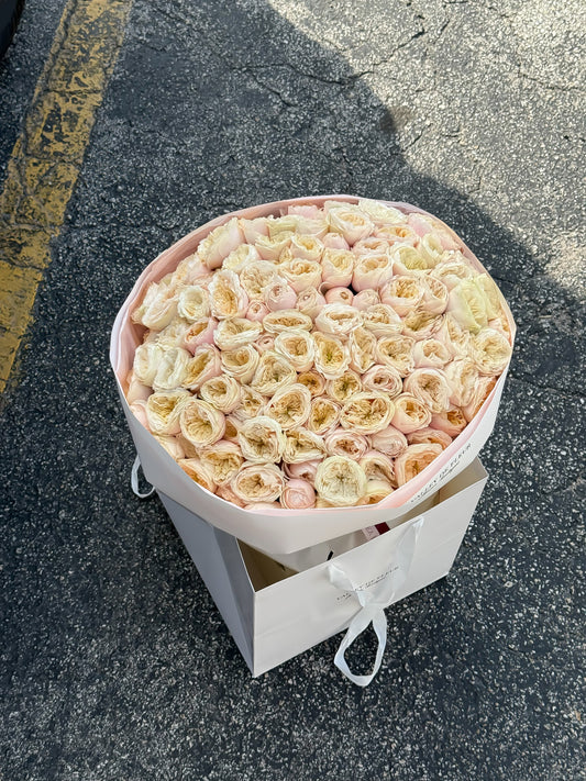 Peach Pudding spray roses bouquet featuring delicate peach blooms