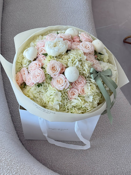 White peonies and hydrangeas bouquet with spray roses