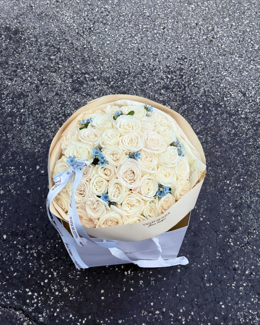White rose bouquet with 45 Playa Blanca white roses