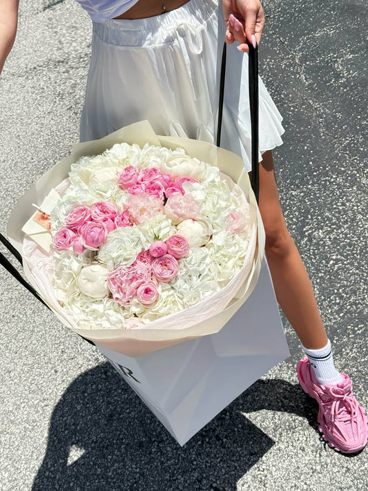 white hydrangea and rose bouquet